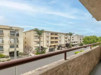a balcony with a view of some buildings at Best Location West LA Spacious condo with hottub in Los Angeles