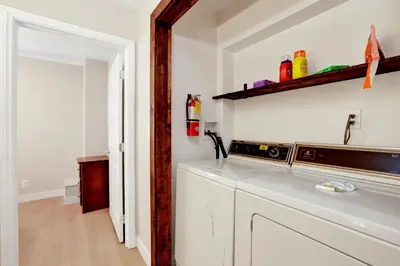 a kitchen with a sink and a counter top at Temple Bear Chalet by Big Bear Vacations in Big Bear Lake