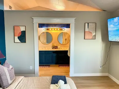a living room with a view of a bathroom at Modern & Spacious Family and Friend 4B3B House in Moreno Valley