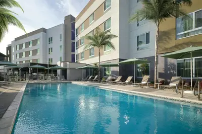 a large swimming pool in front of a building at TownePlace Suites by Marriott Ventura Oxnard in Oxnard
