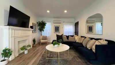 a living room with a couch and a table at Spacious 3BR 3BA Home Private Yard in Culver City in Los Angeles