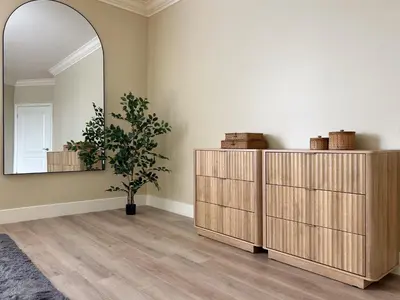 a room with a mirror and a wooden dresser at Modern Top Floor 3BD 3BA Condo Marina del Rey in Los Angeles