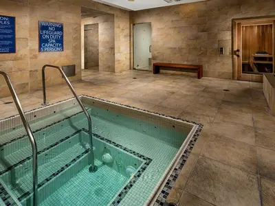 a swimming pool in a room with at Surfs up! Cozy 1 Bedroom Condo with Fountain View in Los Angeles