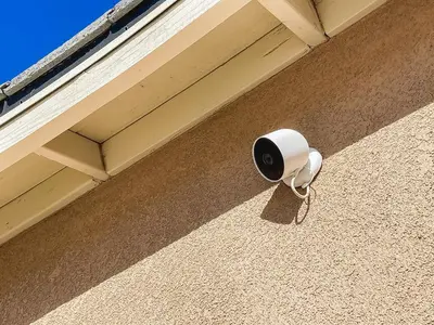 a security camera on the side of a building at California 3-Bedroom Desert Escape With Garden in Victorville