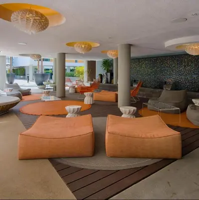 a lobby with couches and tables in a building at The rose-Spacious 3-Bedroom Retreat in the Heart of Marina del Rey in Los Angeles