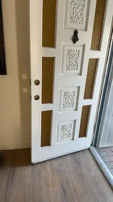 a door with a design on it in a room at New renovated room with shared bathroom in Hacienda Heights
