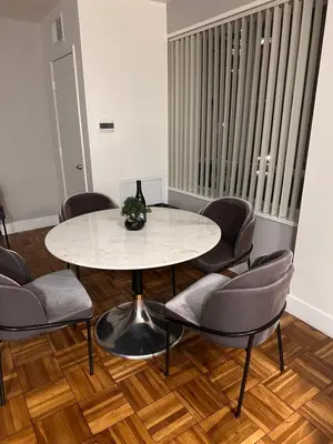 a meeting room with a table and chairs at Warm and Welcoming in Los Angeles