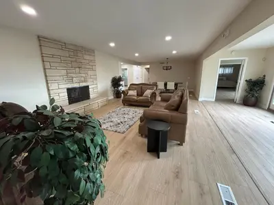 a living room with a couch and a fireplace at Private Hillside Home with View - Yaamava - NOS in San Bernardino