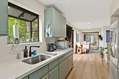 a kitchen with a sink and a window at Designer Laurel Canyon Retreat, Hollywood Hills in Los Angeles