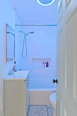 a bathroom with a tub and a sink and a toilet at Designer Laurel Canyon Retreat, Hollywood Hills in Los Angeles
