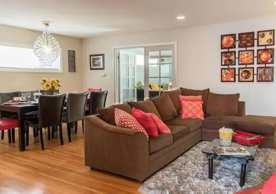 a living room with a couch and a dining room at MagicwayVillas Mickey's Pool Club House - Pool & Spa - Walking to Disneyland in Anaheim