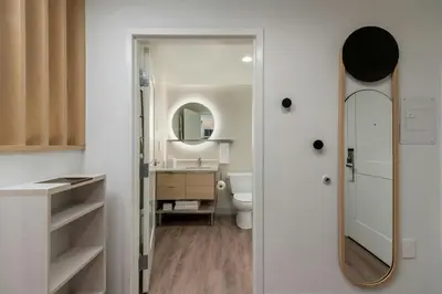 a bathroom with a sink and a mirror at TownePlace Suites by Marriott Palmdale in Palmdale