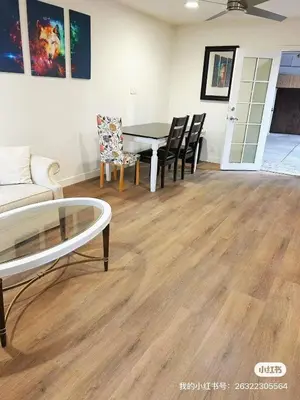 a living room with a dining room table and chairs at Luxury suite private entrance in Hacienda Heights