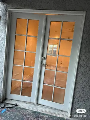 a door with three glass windows in a room at Luxury suite private entrance in Hacienda Heights