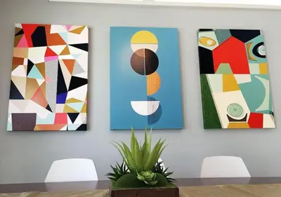 four paintings hanging on a wall with four chairs at MagicwayVillas Star Wars House - Walking Distance to Disneyland in Anaheim