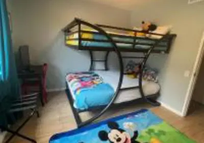 a childs room with a bunk bed and a play area at Magicway Villas Mini's Poolside and Spa - Across Disneyland in Anaheim
