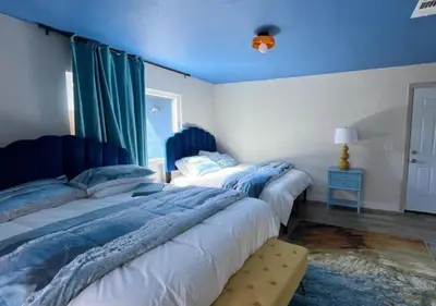 a bedroom with two beds and a window at MagicwayVillas Avetar Villa - 5 Bedroom 3 Bath - Spa and Splash Pad in Anaheim