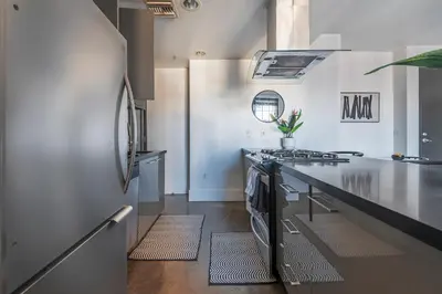 a kitchen with a stove and a counter top at Urban Luxe LOFT in Los Angeles