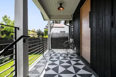 a porch with a black and white checkered floor at Westminster Bungalow - Front House with Private Entrance in Los Angeles