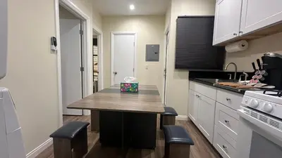 a kitchen with a table with a gift on it at 2B2B quiet comfy home in Hacienda Heights