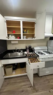 a kitchen with a sink and a stove at 2B2B quiet comfy home in Hacienda Heights