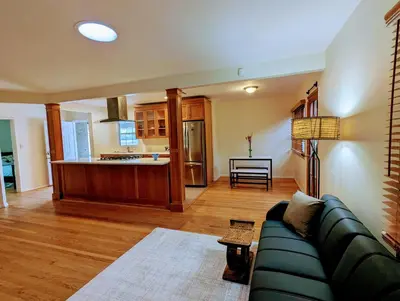 a living room with a couch and a kitchen at Entire House,Convinient location in Los Angeles , near Universal, Hollywood, Pets Friendly, Free WIFI in Sherman Oaks Community Hospital Heliport