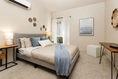 a bedroom with a bed and a window at Signature One Bedroom Apartment in Los Angeles