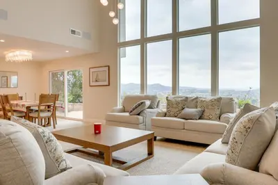 a living room with couches and a table at 2 Mi to Promenade at Westlake Mtn-View Haven! in Westlake Village
