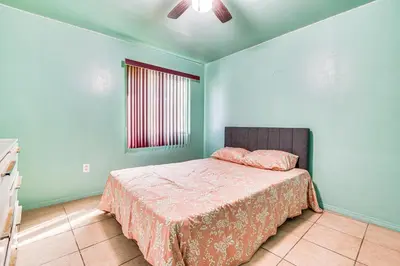 a bedroom with a bed and a window at 8 Mi to Dtwn LA Apt with Shared Patio! in Los Angeles