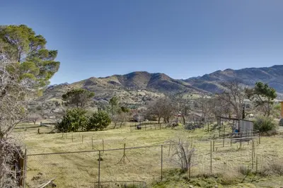 a view of a field with mountains in the background at 6 Mi to Lake Isabella Mountain Mesa Getaway in Mountain Mesa