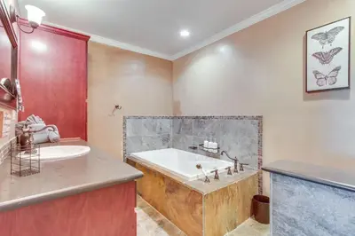a large bathroom with a tub and a sink at 6 Mi to Lake Isabella Mountain Mesa Getaway in Mountain Mesa