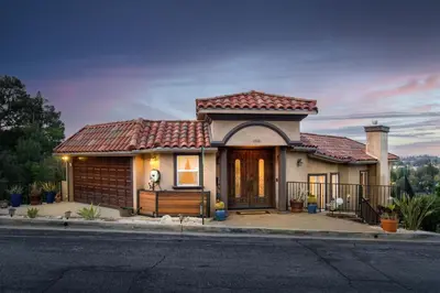 a house on a street with a house at Luxury Modern w/ Great LA Views in Woodland Hills