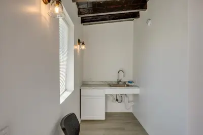 a kitchen with a sink and a window at Mountain Views Minimalist California Studio in Frazier Park