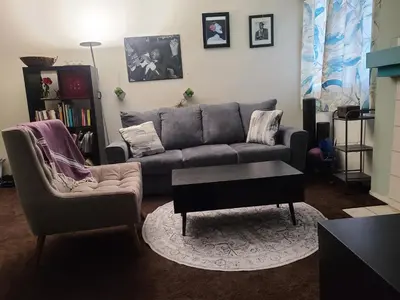 a living room with a couch and a coffee table at Guest Room in Sherman Oaks with private bathroom and balcony in Sherman Oaks