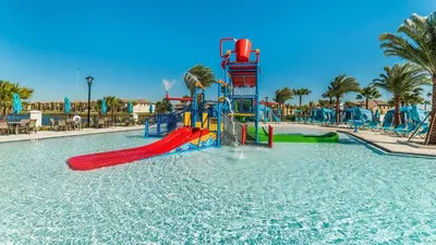 a water park with a slide in the water at ROM2112 in Los Angeles