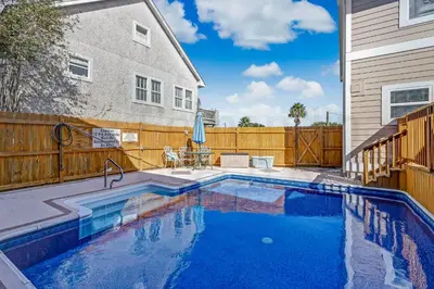 a swimming pool in the backyard of a house at Particle Ocean View 2505B W 5th St in Los Angeles