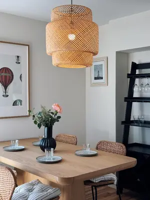 a dining room with a wooden table with chairs at Cozy Private Room C in S Central LA in Los Angeles
