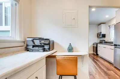 a kitchen with a desk with a printer on a counter at Home 1 Mi to DTLA Room to Work and Relax! in Los Angeles