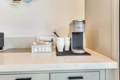 a coffee maker on a counter in a kitchen at 1 Mi to Rose Bowl! Updated Home with Furnished Deck in Pasadena