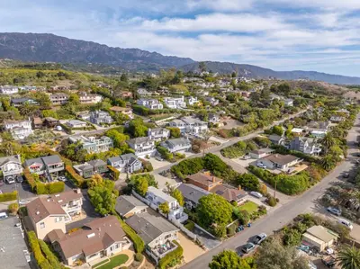 an aerial view of a residential suburb with houses at The Hidden Hideaway in Summerland