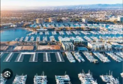 an aerial view of a marina with boats in the water at Stunning 2BR Penthouse Patio & View Venice MDR in Los Angeles