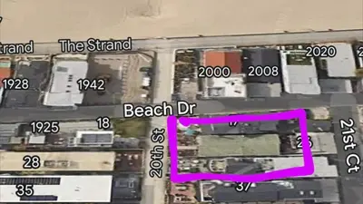 a map of a parking lot with a beach district at Charming 1920s Hermosa Bungalow Steps from The Strand in Hermosa Beach