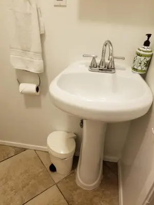 a bathroom with a white sink and a toilet at Studio in Southbay close to the beach SoFi stadium LAX in Lawndale