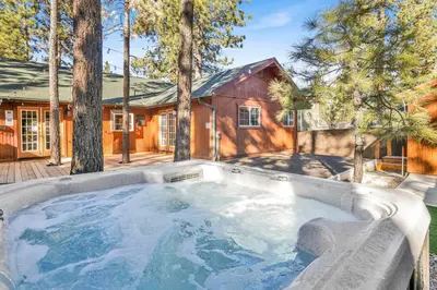 a hot tub in the backyard of a house at Oriole House #2518 in Big Bear Lake