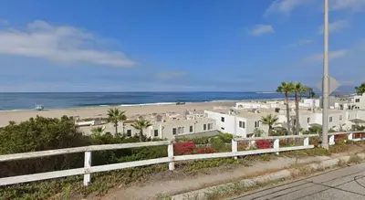 a view of a beach with houses and palm trees at Sleek Luxury Studio with Patio LAX & Beach Access in Los Angeles