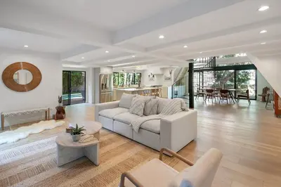 a living room with a couch and a table at Studio City Stunning House with 5 bedrooms, Pool, Jacuzzi, Fire-pit, Guest House in Studio City