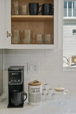 a kitchen counter with a coffeemaker and a coffee maker at NEW Koreatown l Universal Studios in Vernon