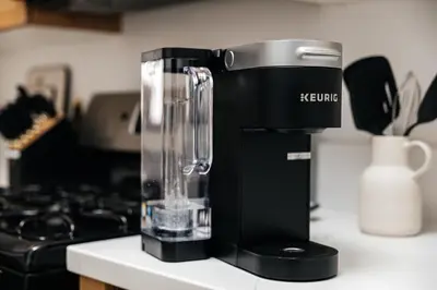 a black blender sitting on a kitchen counter at Seaside Serenity - Chic Santa Monica Studio in Los Angeles