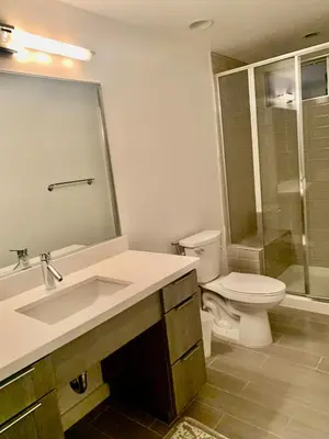 a bathroom with a sink and a toilet and a shower at Masion de Beverly Hills in Los Angeles
