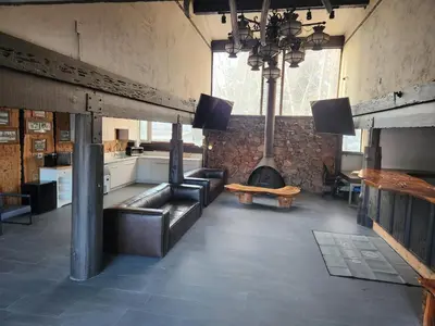 a large room with a couch and a stove at Studio 9 Big Bear Lake in Big Bear Lake